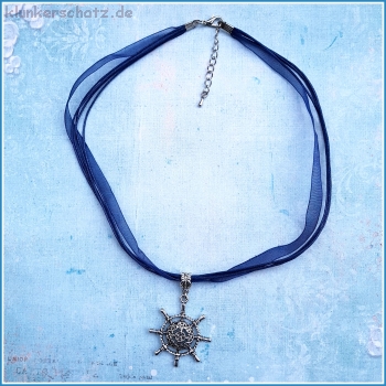 "Steuer" am marineblauen Halsband