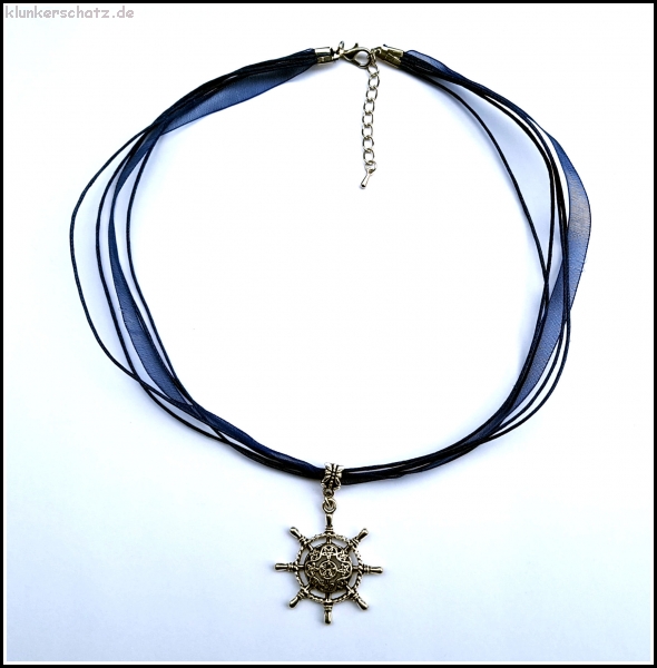 "Steuer" am marineblauen Halsband